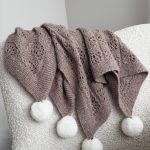 Hand Knitted Alpaca Baby Blanket – Taupe with Fur Pom Poms